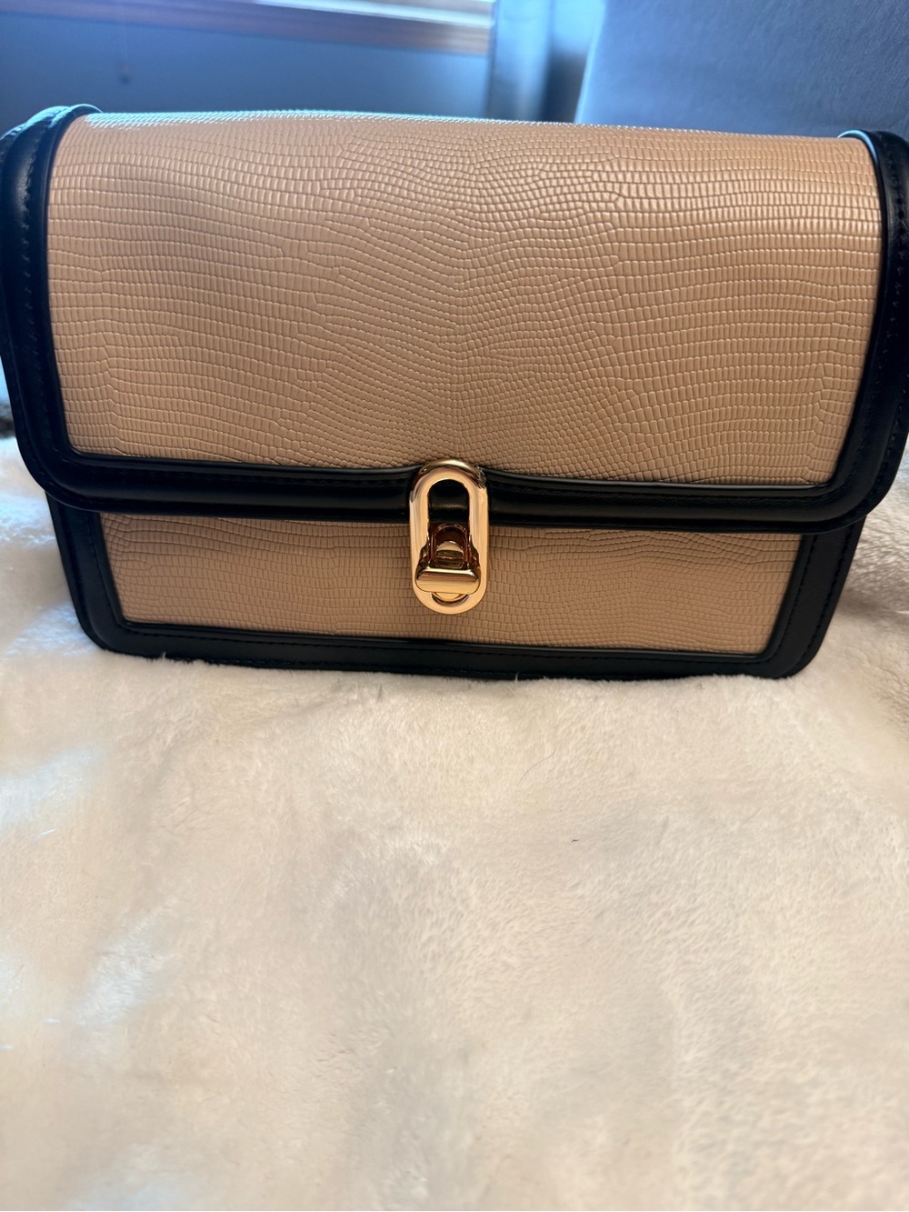 Structured Beige Crossbody Bag with Black Trim and Gold Turn-Lock
